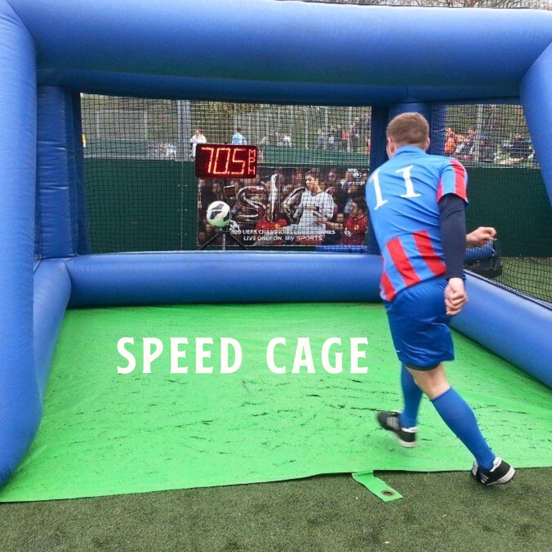 boy in football strip kicking ball into football speed cage